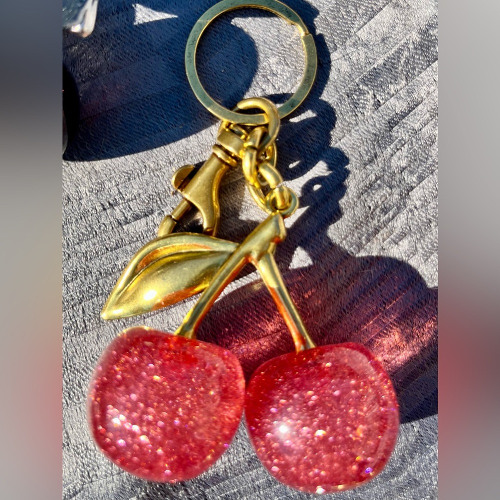 Cherries keychain bag charm. Coach like fashion, unbranded. New. Pink gold
